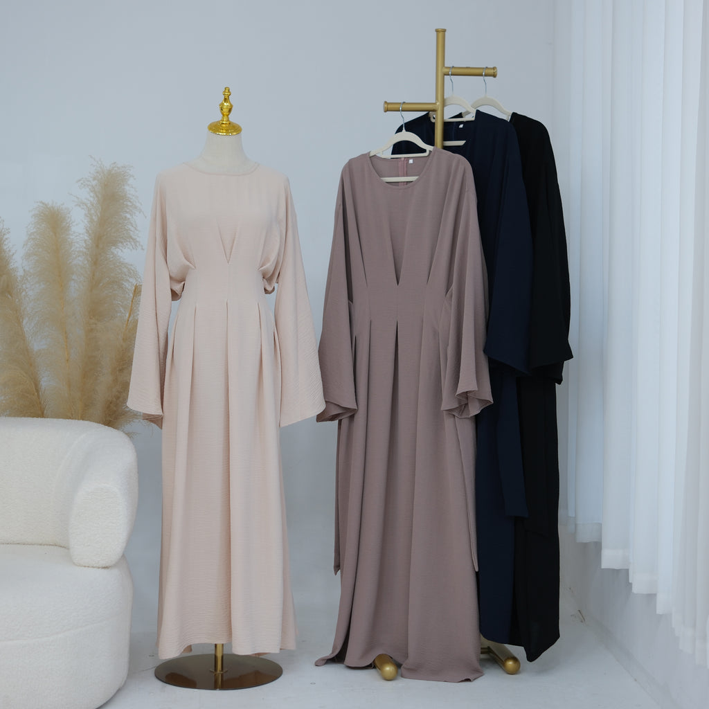 Robe cintrée à plis