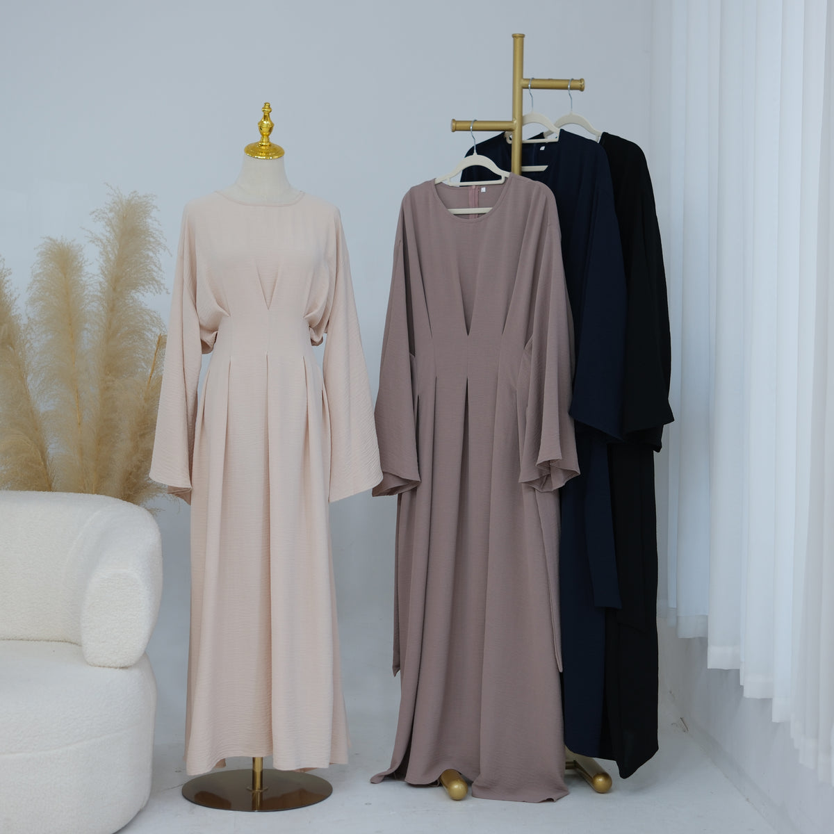 Robe cintrée à plis